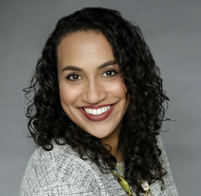 Christina smiling in her portrait.
