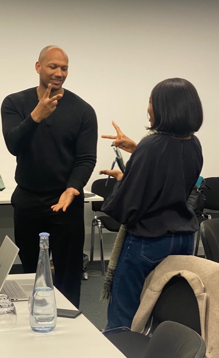 Two FairBuild members sharing ideas during a workshop.